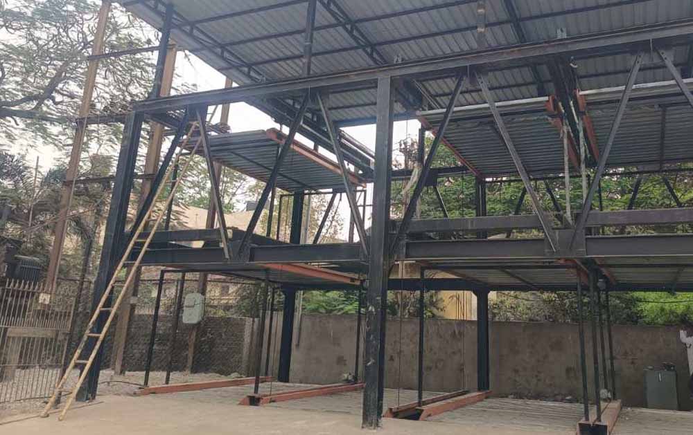 महानगरों की तर्ज पर रायपुर को मिली सौगात: शहर की पहली मैकेनाइज्ड मल्टीलेवल पार्किंग तैयार, 12 कारों की होगी एक साथ पार्किंग महानगरों की तर्ज पर रायपुर को मिली सौगात: शहर की पहली मैकेनाइज्ड मल्टीलेवल पार्किंग तैयार, 12 कारों की होगी एक साथ पार्किंग